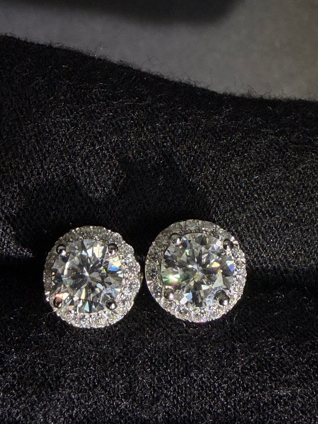 Silver halo moissanite studs — front detail