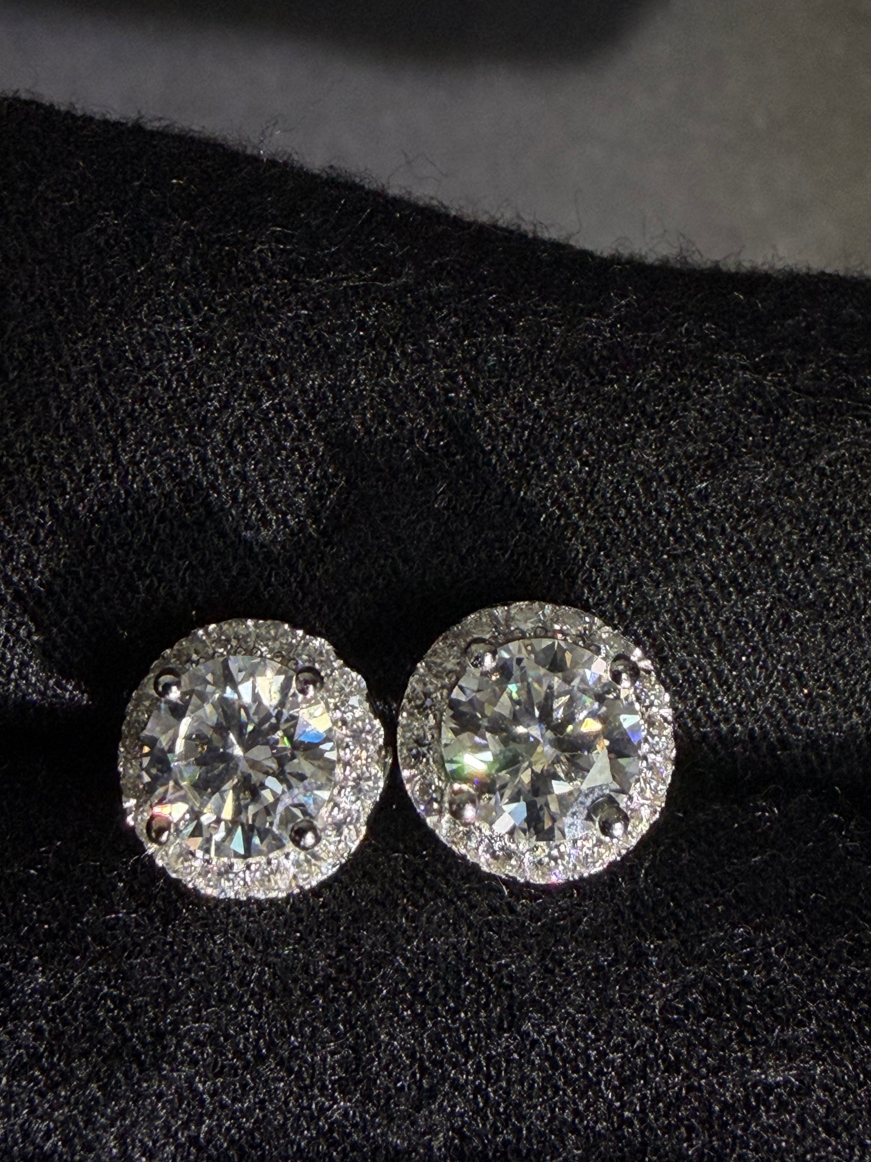 Silver halo moissanite studs — front detail