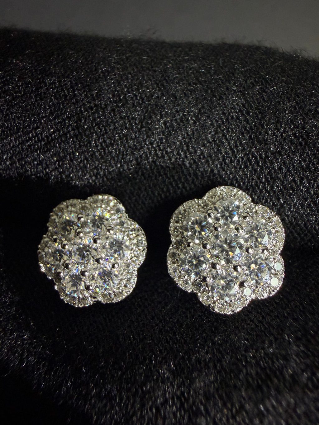 Silver flower moissanite studs — front detail