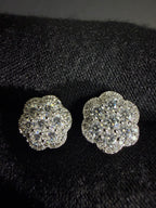 Silver flower moissanite studs — front detail