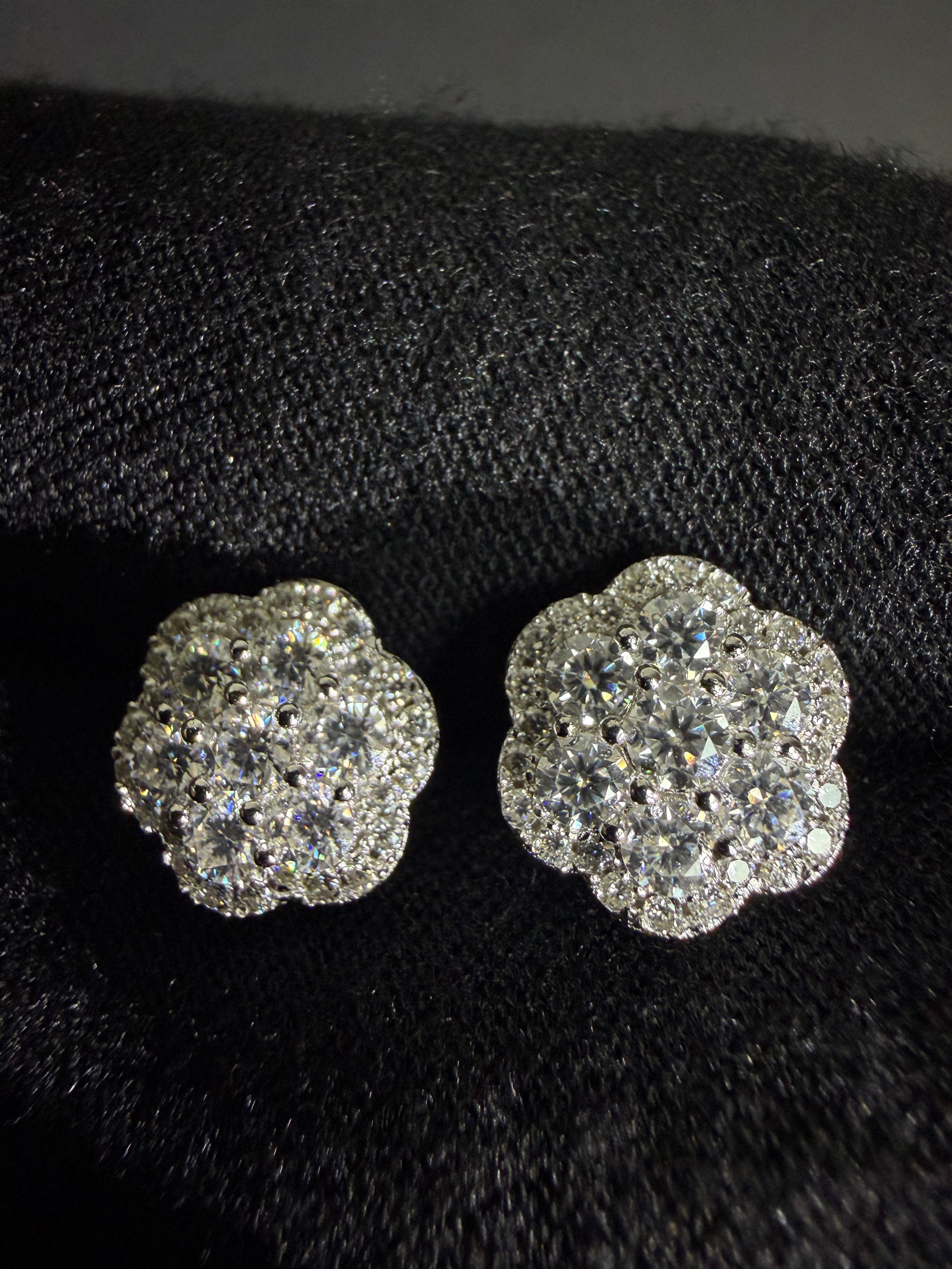 Silver flower moissanite studs — front detail
