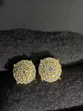 Gold cluster moissanite studs — front detail