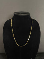 2.4 mm Mini Figaro chain, 22 inches — front view on a black display