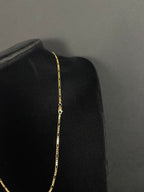 2.4 mm Mini Figaro chain, 22 inches — angled view