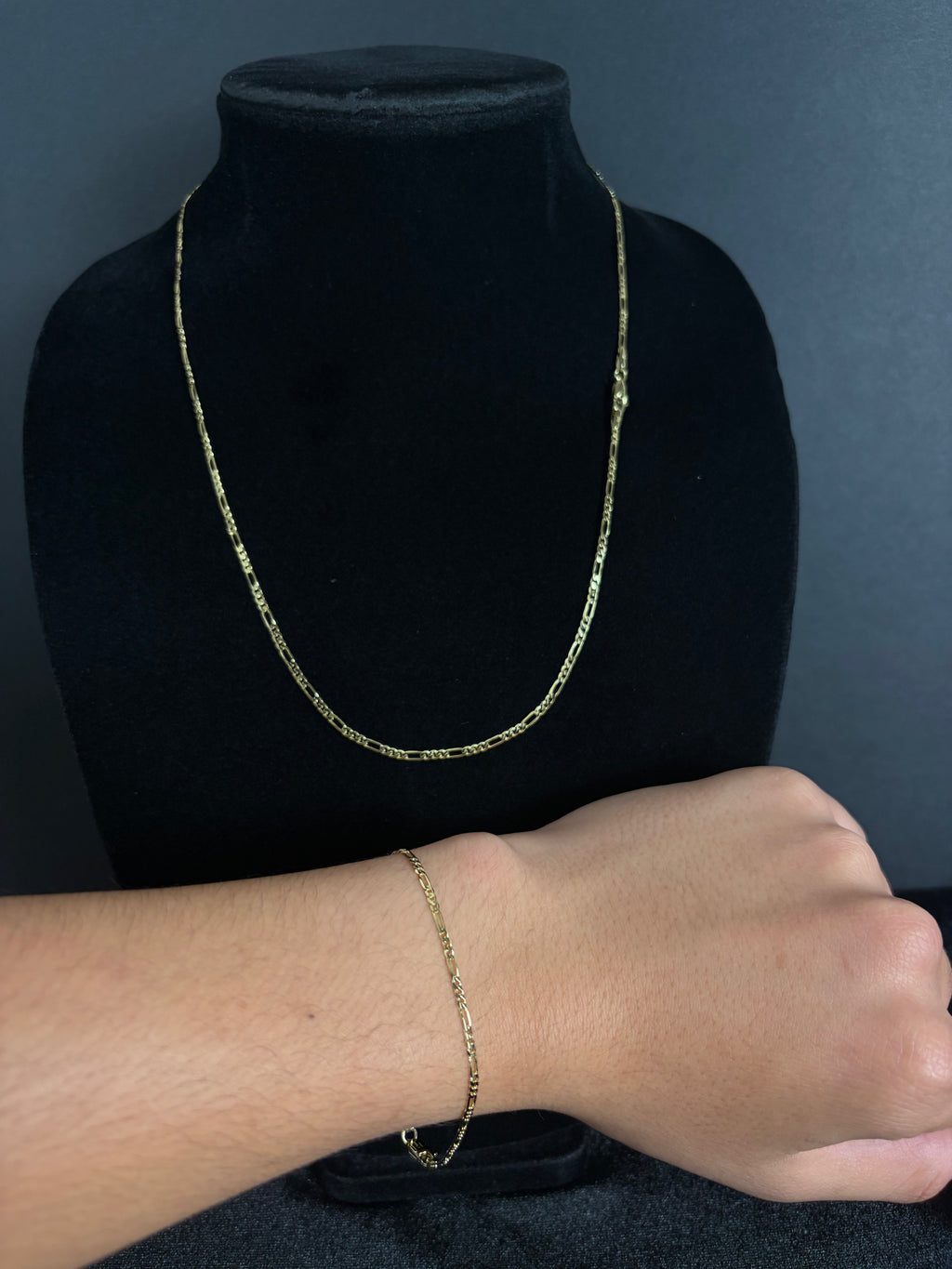 Mini Figaro chain with matching bracelet shown for styling; pieces sold separately