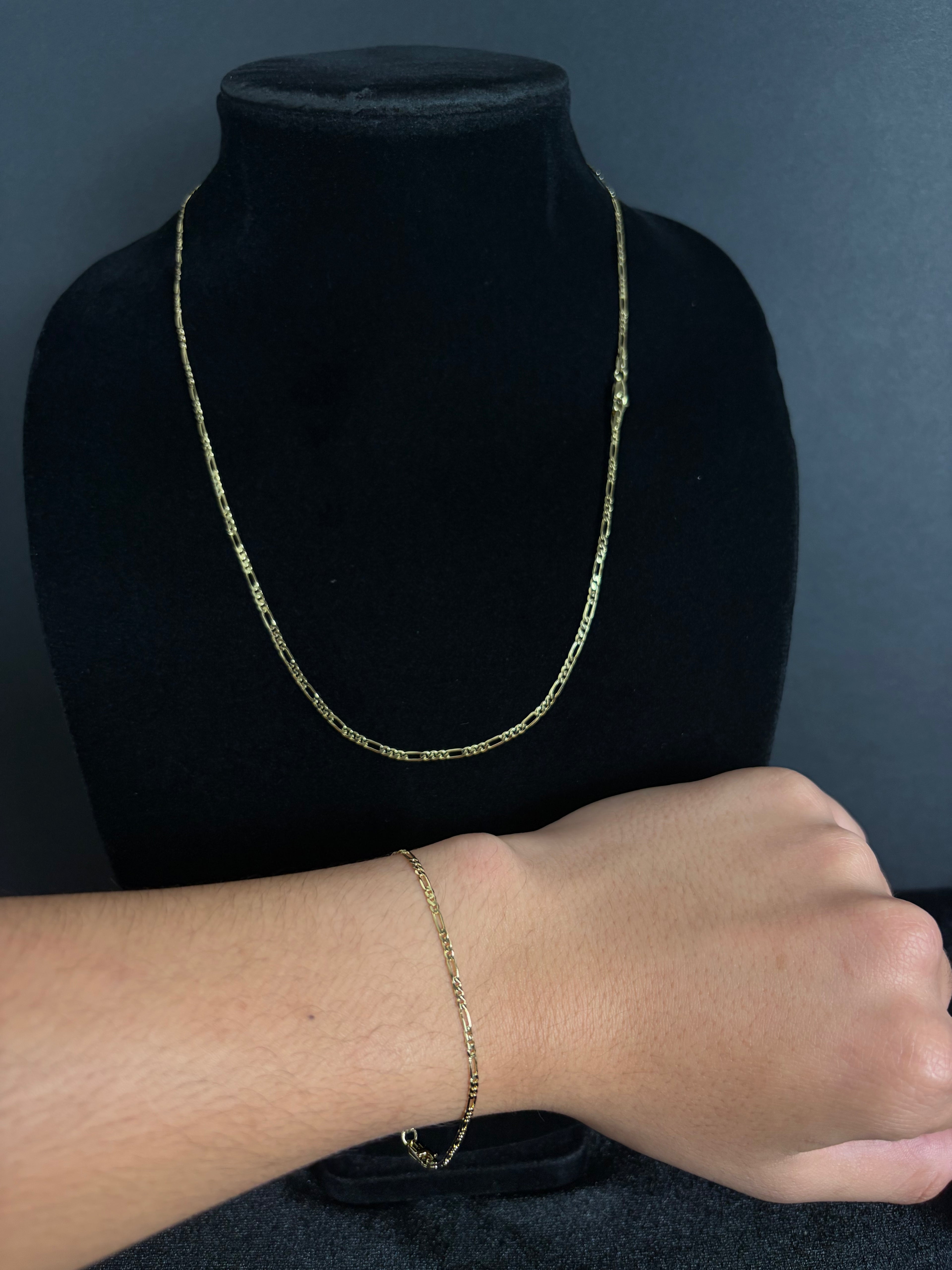 Mini Figaro chain with matching bracelet shown for styling; pieces sold separately