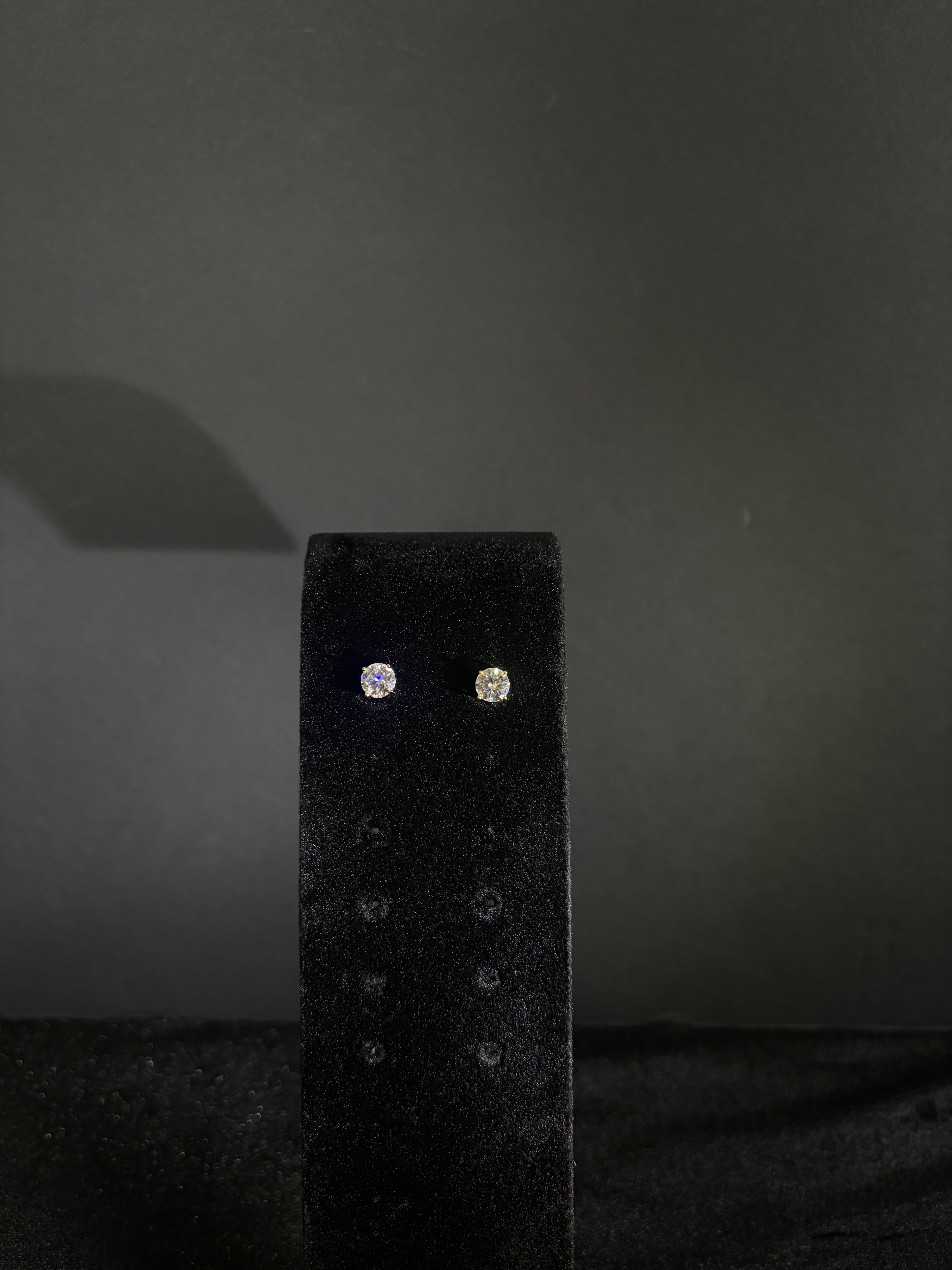 6.5 mm gold-plated sterling silver moissanite studs — pair on display