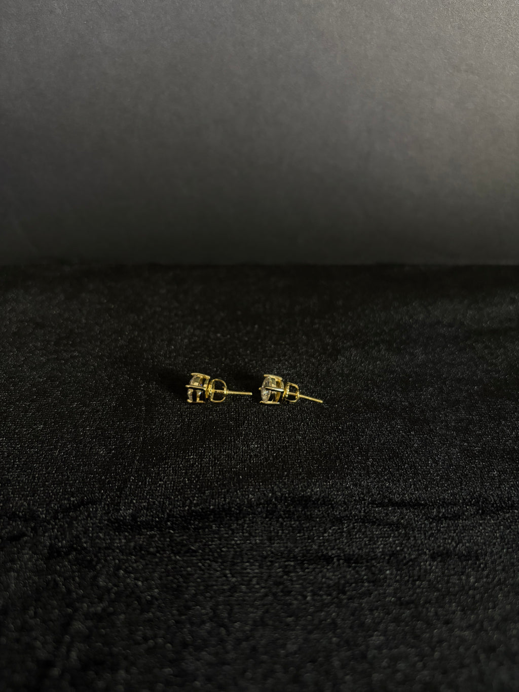 6.5 mm gold-plated sterling silver moissanite studs — setting and post detail