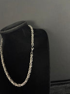 Greek Link chain, 6 mm in 316L stainless steel — angled view