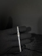 Tennis Bracelet — 4 mm in stainless steel with cubic zirconia; 8 inches